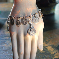 Persevering in Prayer Sterling Charm Bracelet with Rare St.Therese Couderc Medal, 14 Antique French Medals, Antique Bezel Set Faceted Rock Crystal Connectors