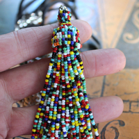 SOLD to J Endless Ocean Necklace with Faceted Rock Quartz Drops,,Sterling Bezel Set Faceted Rock Quartz, Sterling Link Chain,Multi Color Seed Bead Tassel