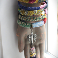 Infinite Possibilities Coiled Kantha & Embroidered Lambani Textile Bracelet with Dove of Peace Medal and Silk Tassel