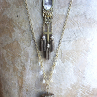It is a Dawn Necklace w/Antique Gold Mesh Capped Light Citrine Quartz Point,Antique Faceted Rock Crystal Stone & Finding, Faceted Citrine & Clear Rock Quartz Briolletes