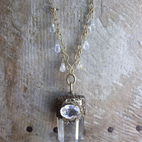 It is a Dawn Necklace w/Antique Gold Mesh Capped Light Citrine Quartz Point,Antique Faceted Rock Crystal Stone & Finding, Faceted Citrine & Clear Rock Quartz Briolletes