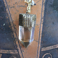 It is a Dawn Necklace w/Antique Gold Mesh Capped Light Citrine Quartz Point,Antique Faceted Rock Crystal Stone & Finding, Faceted Citrine & Clear Rock Quartz Briolletes