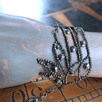 SOLD to J  Precious Wings Bracelet with Rare Antique Cut Steel Wing & Tassel