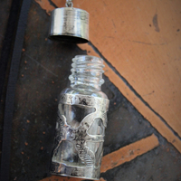 The Wound Necklace w/Long Soft Braided Suede Leather,Antique Sterling Oil/Prayer Vessel,Figural Hand,Bird,Sword + Faceted Rock Crystal