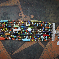 Raise You to the Heavens Bracelet w/12 Antique Mardi Gras Bead Strands,Antique Kuchi Gypsy Tassel,Antique Marian Medal,Antique Coptic Cross and Much More!