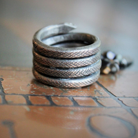 The Triumph Ring w/Antique Sterling Coiled Serpent Band,Antique French Marian & Sacred Heart of Jesus Medals,Antique Sterling Cross,Antique Faceted Glass Bead Connectors