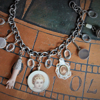 All over the Sky Bracelet w/Antique French Medals, Sterling Chain,Antique Glass Picture Locket, 2 Rare Tiny Glass Bubble Lockets,Antique Sterling "Rattle", Antique MOP Glass Inset Notre Dame Drop & More!