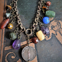In the Whispers Necklace with Multi Faceted & Polished Gemstones, Antique French Our Lady of Lourdes Medal, Leather Tassel, Leather Ties