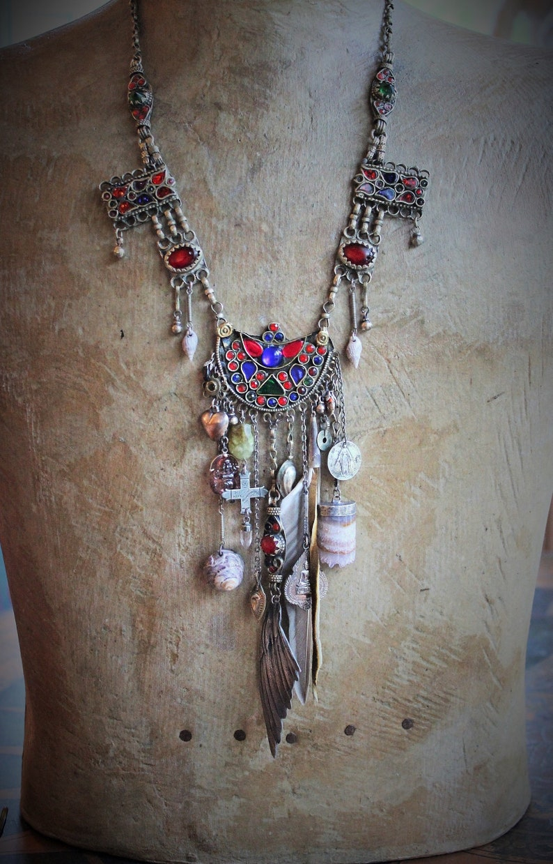 This Sky Necklace w/Antique Gypsy Chain,Cast Bird Wing,Antique Engraved Cross,Old Tibetan Medal,Carved Tourmaline Buddha + Much More!