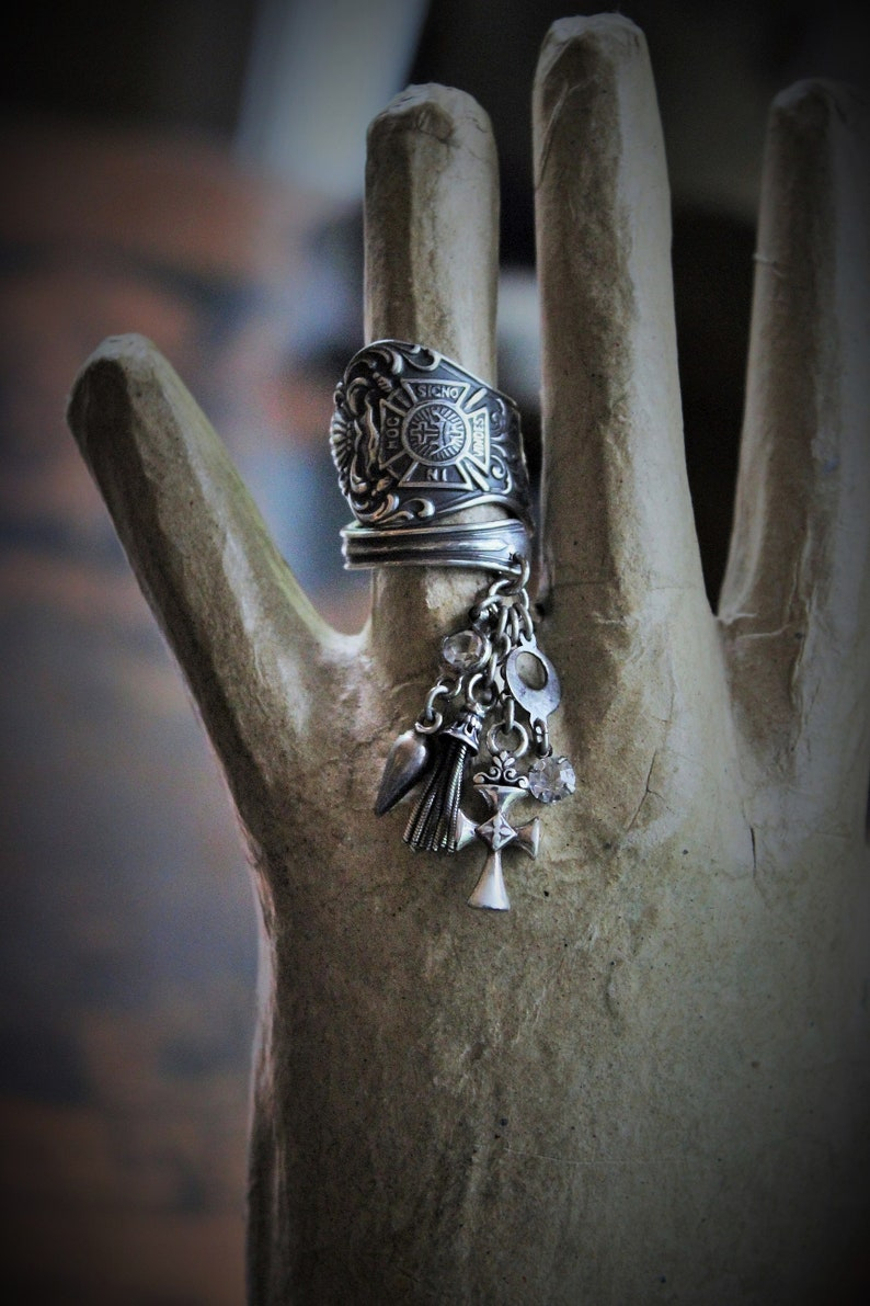 In this Sign Antique Sterling Masonic Wrap Ring w/Sterling Cross,Sterling Tassel,Antique Faceted Crystal Drop