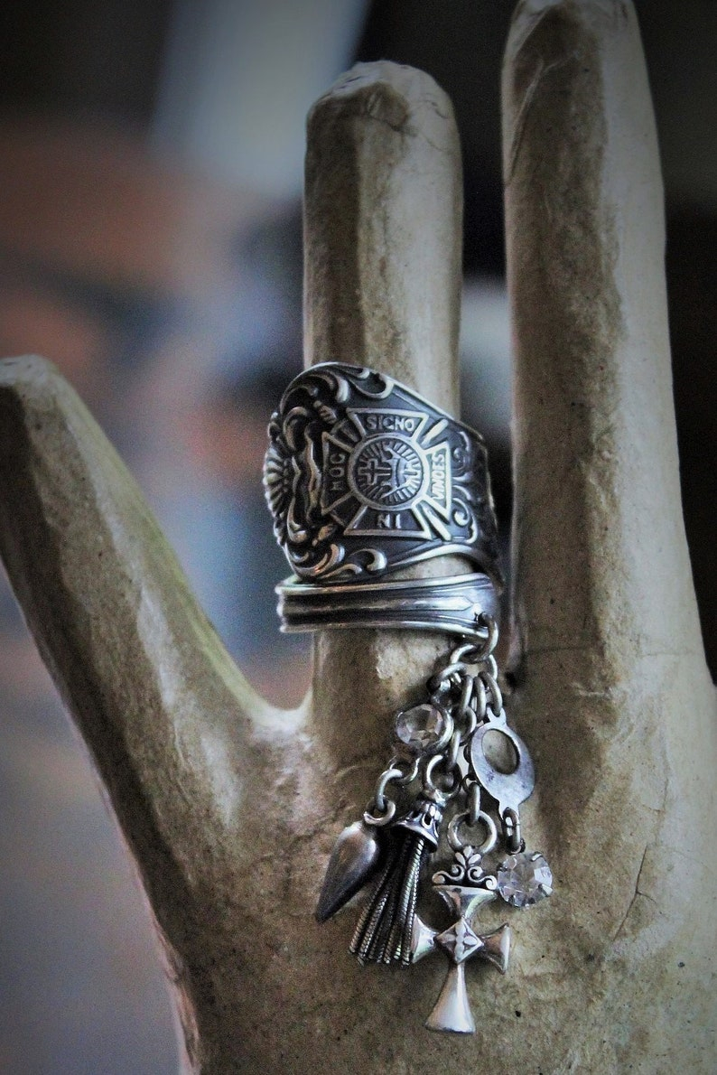 In this Sign Antique Sterling Masonic Wrap Ring w/Sterling Cross,Sterling Tassel,Antique Faceted Crystal Drop