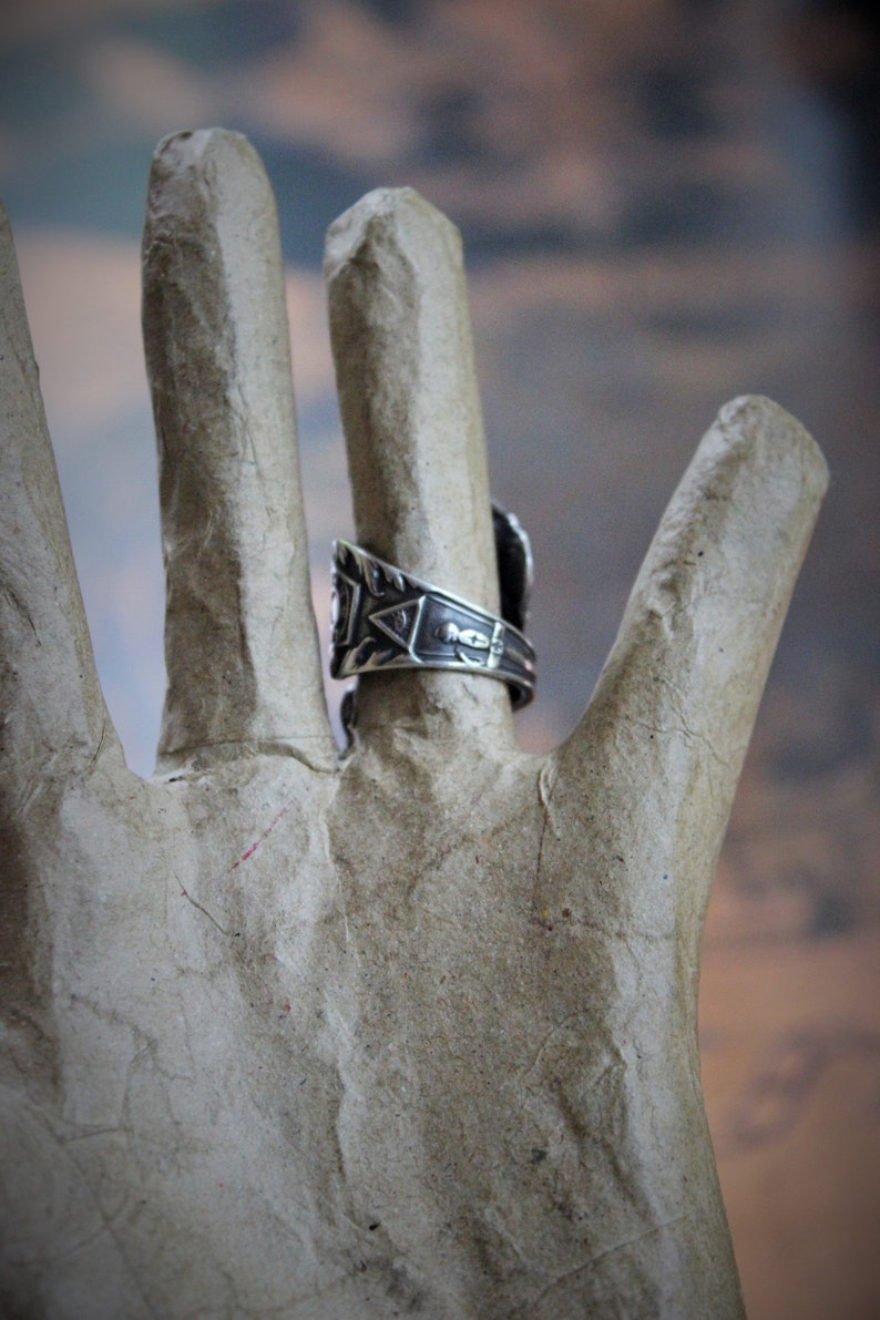 In this Sign Antique Sterling Masonic Wrap Ring w/Sterling Cross,Sterling Tassel,Antique Faceted Crystal Drop