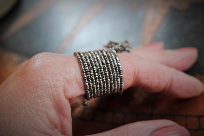 Antique Faceted Cut Steel Bead 12 Coil Ring w/Antique French Medals,Sterling Capped Crystal Point,Antique Faceted Crystal Drops