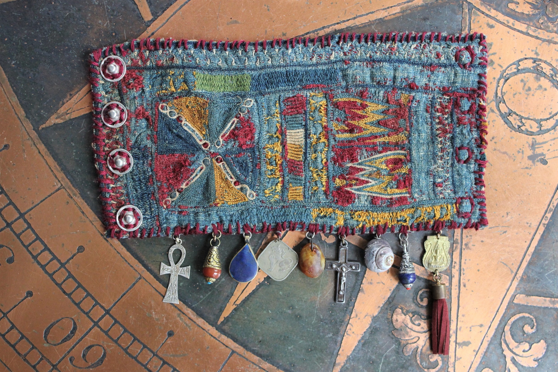 SOLD to L Wide Antique Lambani Textile Cuff with Assorted Antique Medals, Crosses and Drops