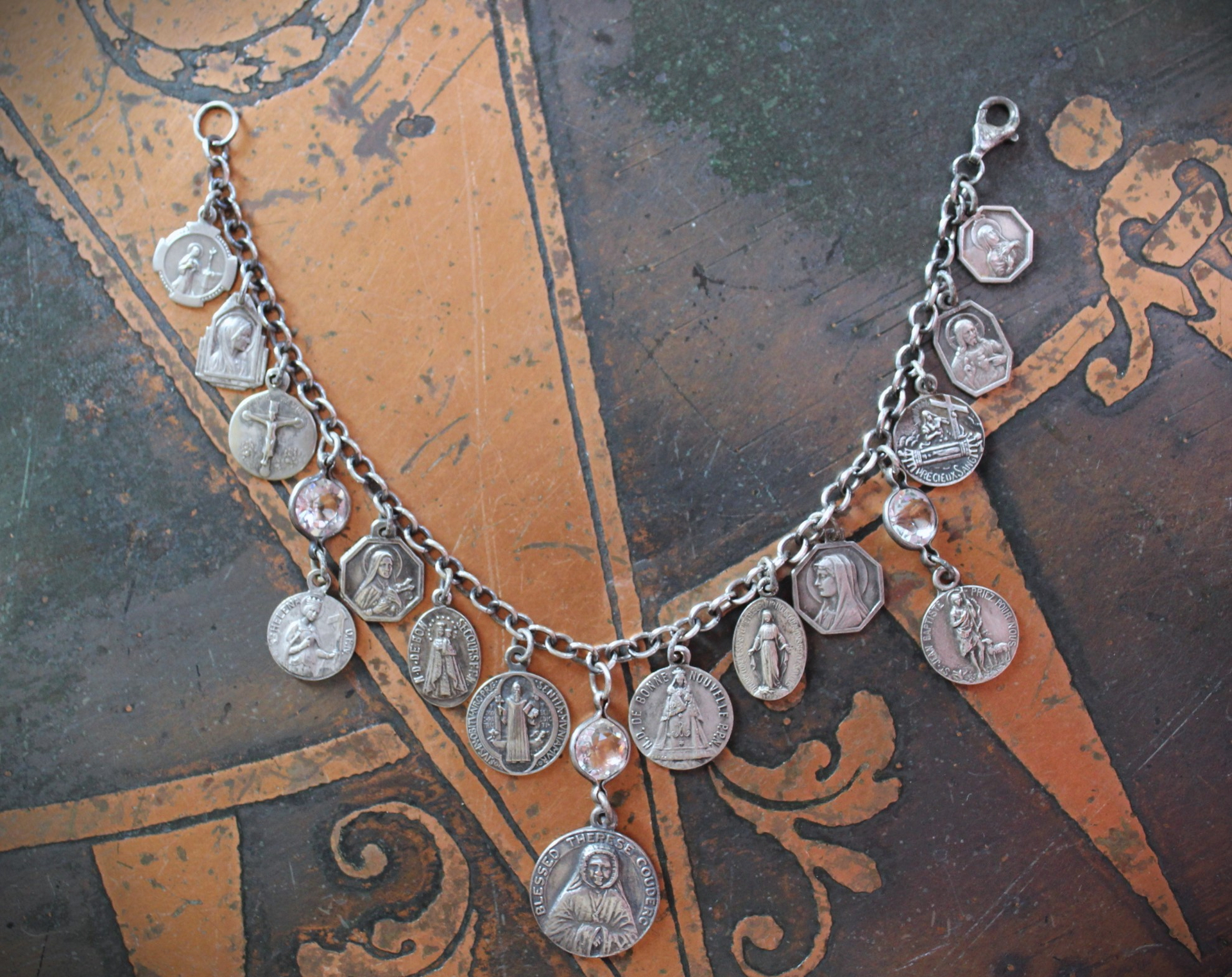 Persevering in Prayer Sterling Charm Bracelet with Rare St.Therese Couderc Medal, 14 Antique French Medals, Antique Bezel Set Faceted Rock Crystal Connectors