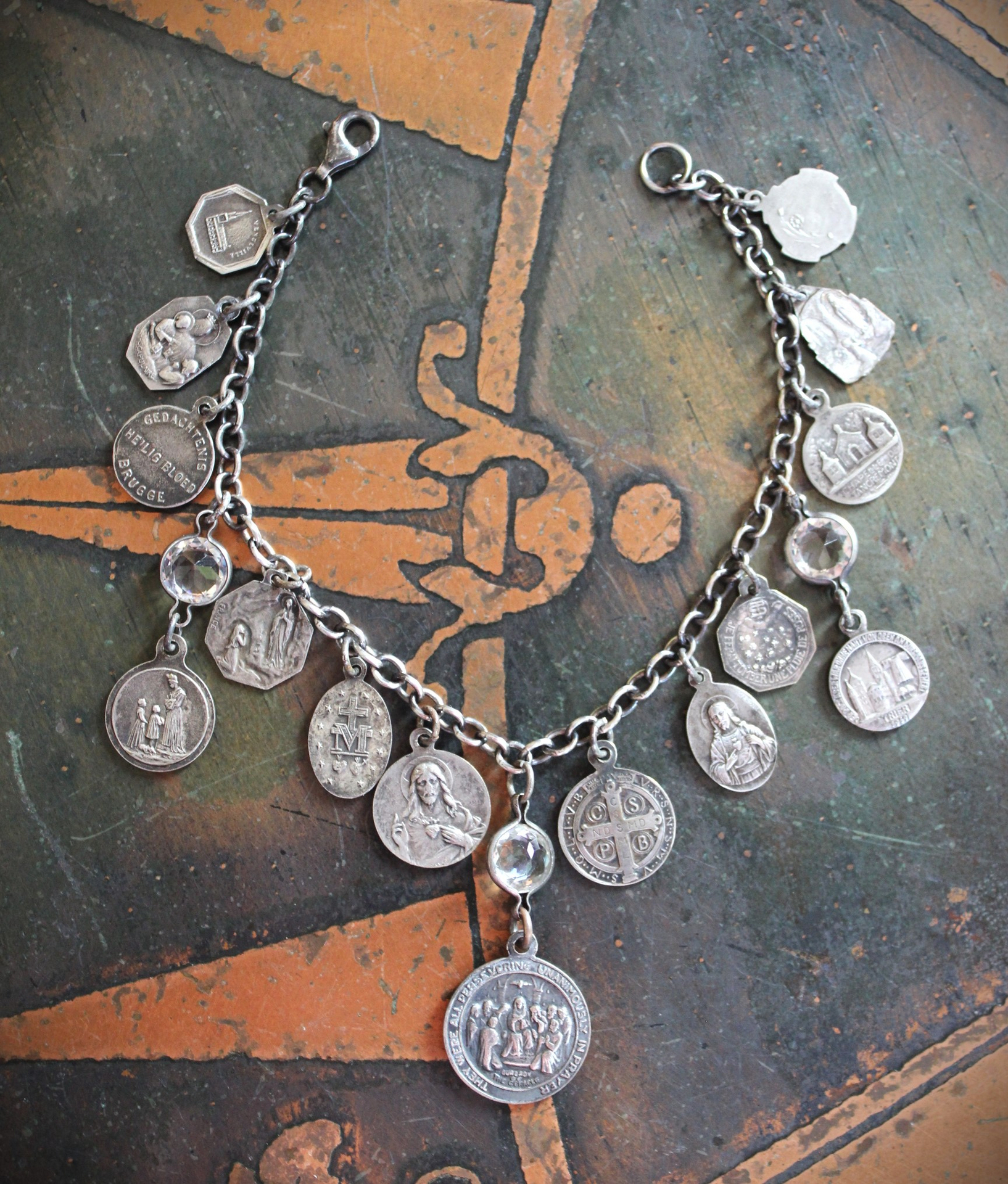 Persevering in Prayer Sterling Charm Bracelet with Rare St.Therese Couderc Medal, 14 Antique French Medals, Antique Bezel Set Faceted Rock Crystal Connectors