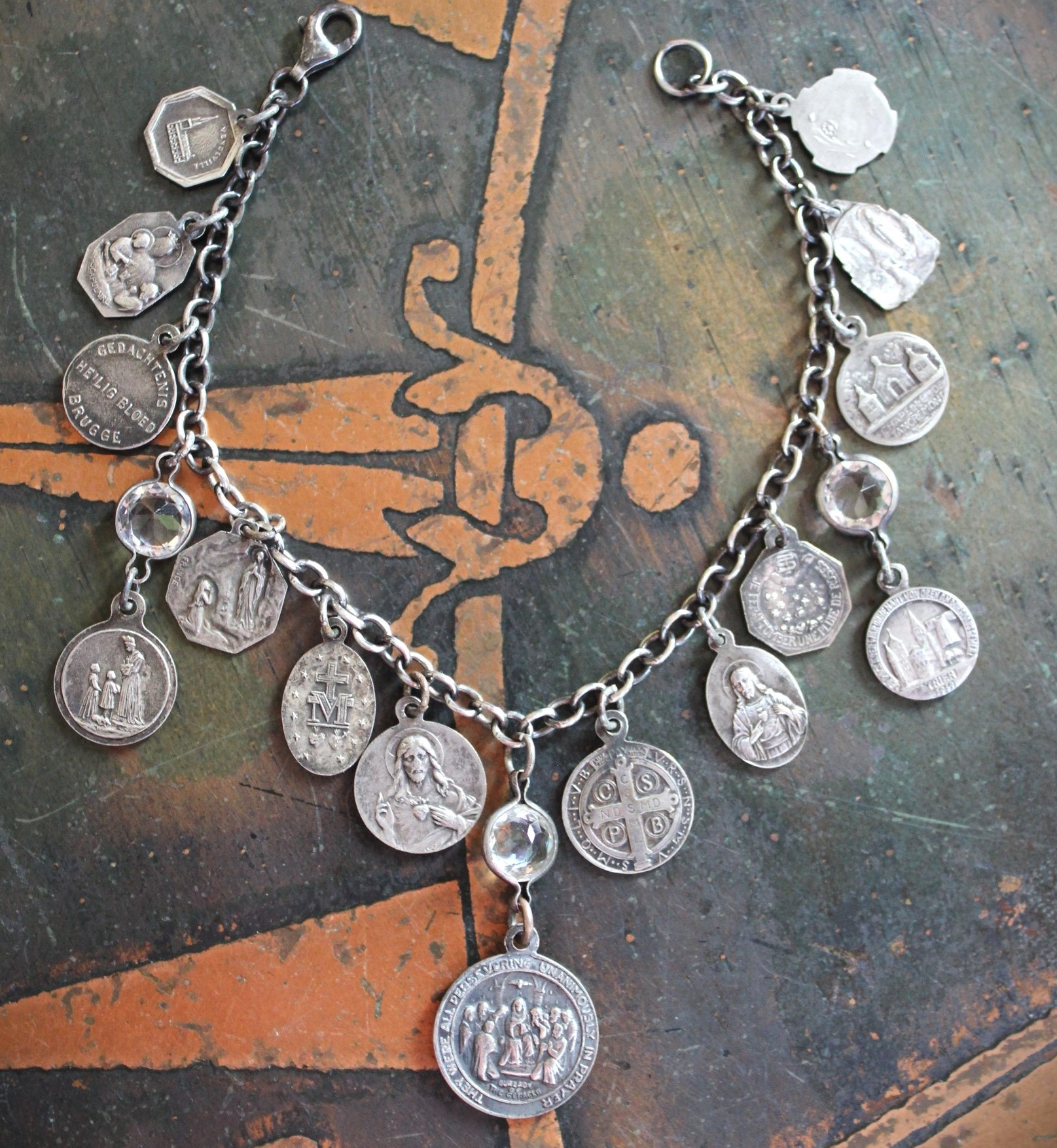 Persevering in Prayer Sterling Charm Bracelet with Rare St.Therese Couderc Medal, 14 Antique French Medals, Antique Bezel Set Faceted Rock Crystal Connectors