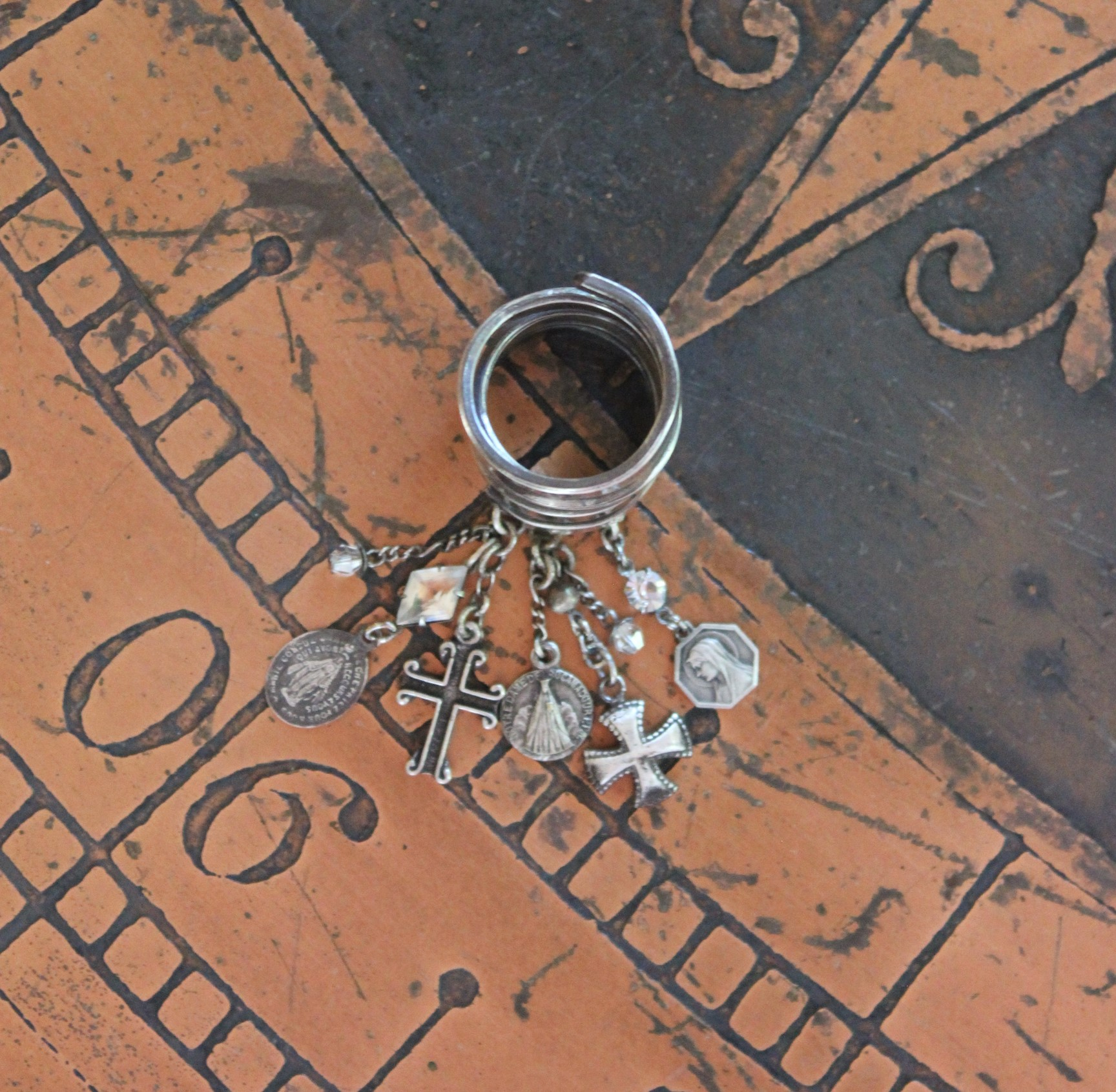 Wide Solid 999 Sterling Artisan Wrap Ring with Multiple Tiny Antique Medals, Sterling Crosses, Faceted Rock Crystal Connectors