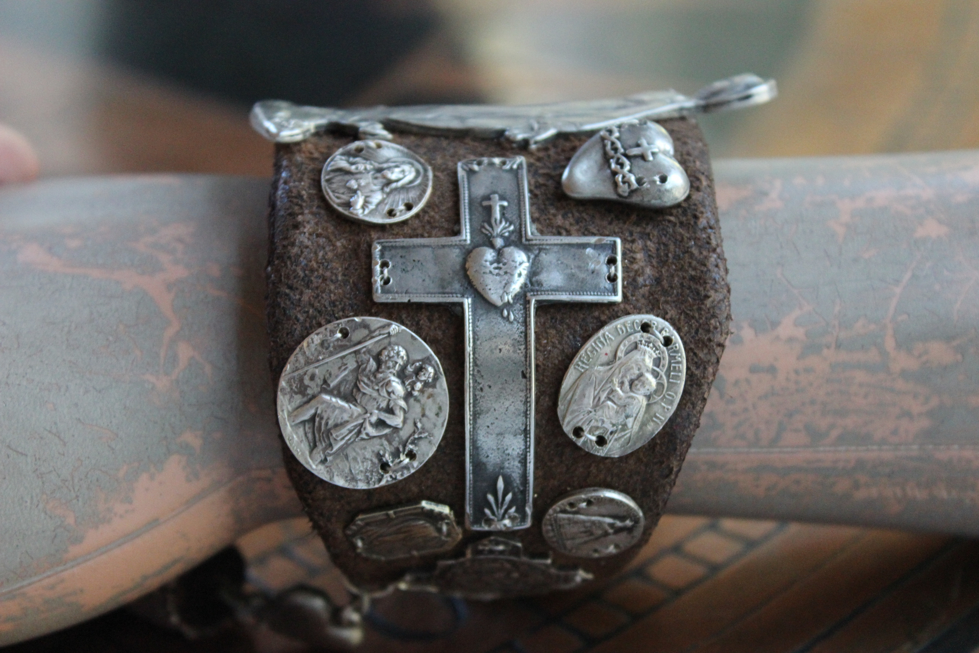The Milagro Cuff Bracelet with Distressed Leather, 16 Antique & Vintage Crosses and Medals and Leather Tassel