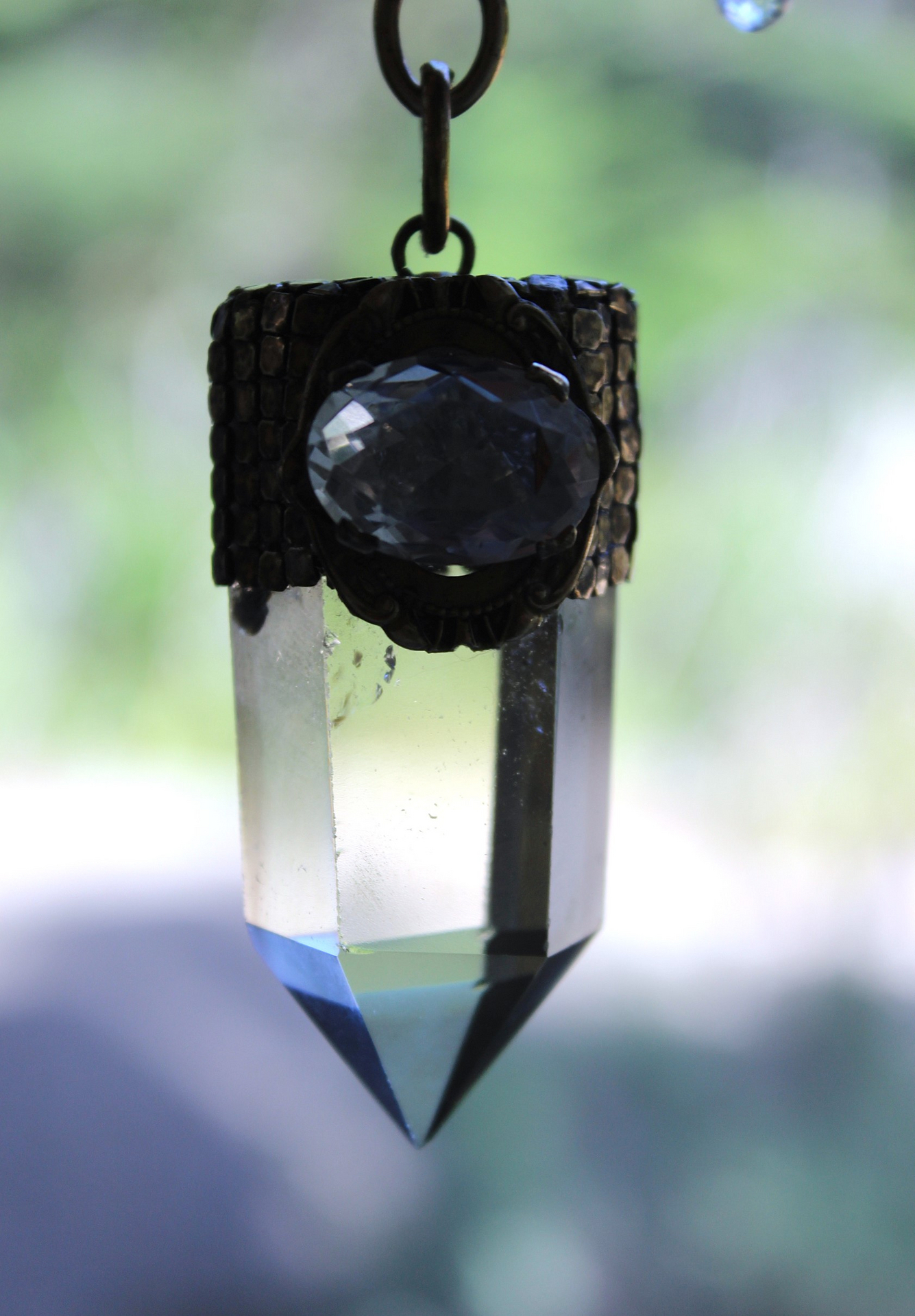 It is a Dawn Necklace w/Antique Gold Mesh Capped Light Citrine Quartz Point,Antique Faceted Rock Crystal Stone & Finding, Faceted Citrine & Clear Rock Quartz Briolletes