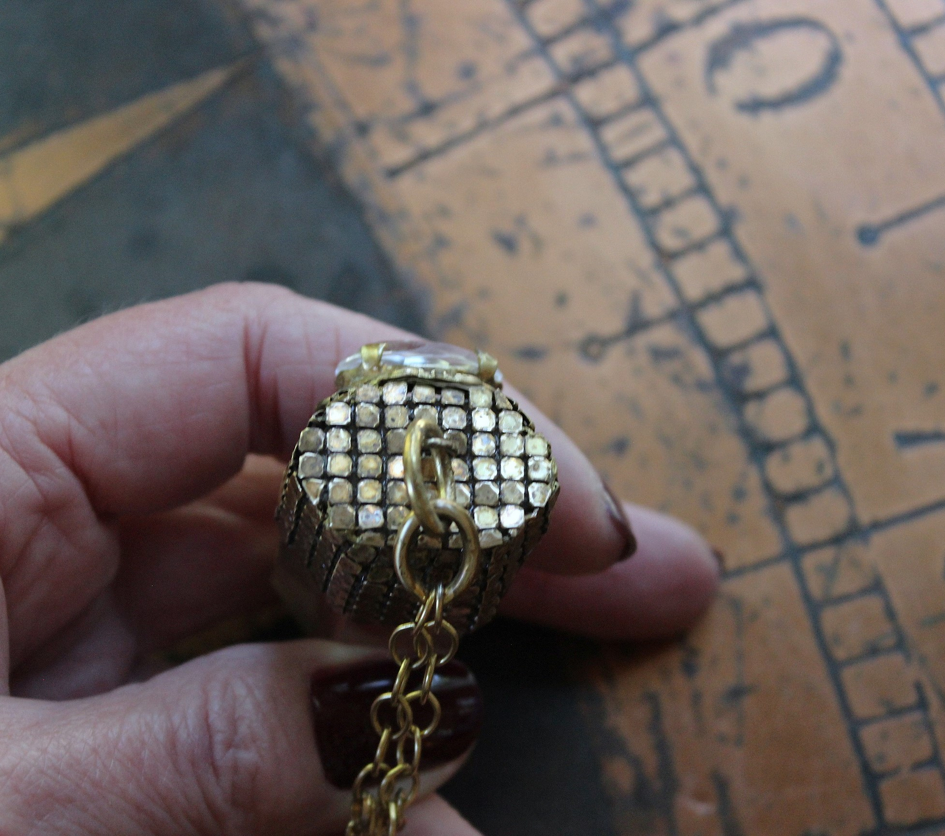 It is a Dawn Necklace w/Antique Gold Mesh Capped Light Citrine Quartz Point,Antique Faceted Rock Crystal Stone & Finding, Faceted Citrine & Clear Rock Quartz Briolletes