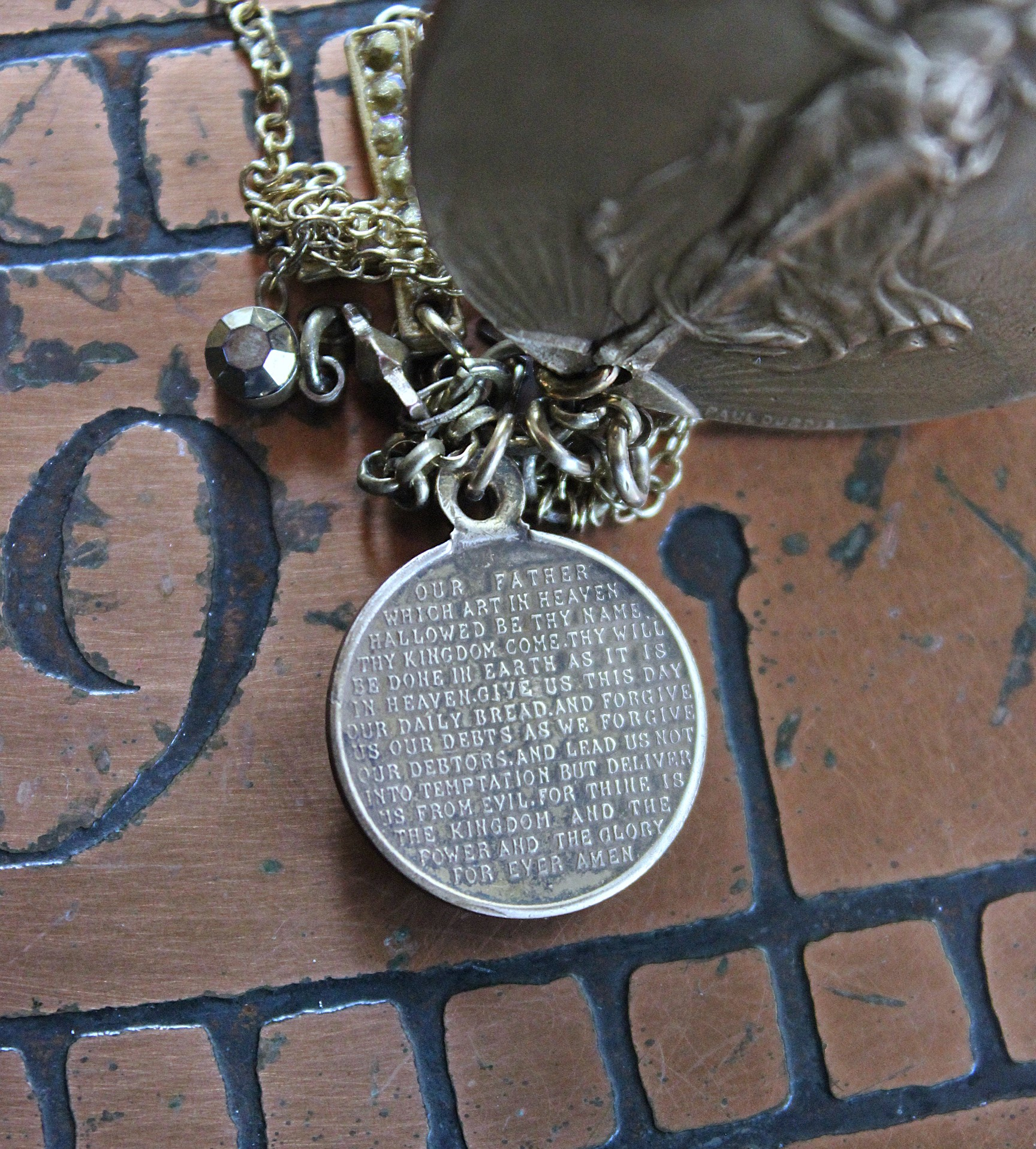 We Rise Bronze Ring with Antique WW1 Victory Medal,Tiny Lord's Prayer Coin,Star, Chain Tassel & Cross
