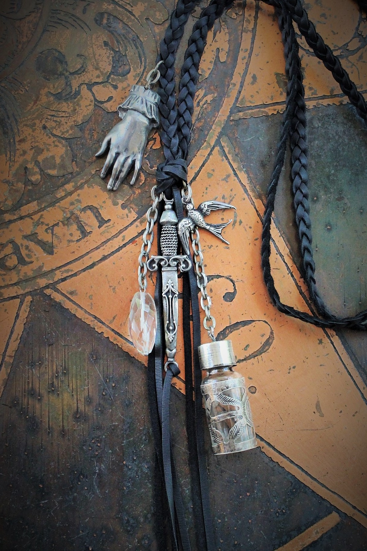 The Wound Necklace w/Long Soft Braided Suede Leather,Antique Sterling Oil/Prayer Vessel,Figural Hand,Bird,Sword + Faceted Rock Crystal