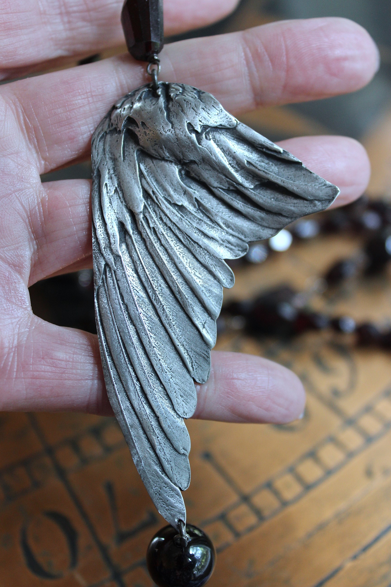 NEW! The Winds of your Soul Necklace with Amazing Faceted Almandine Garnet, Cast Bird Wing, Holy Spirit Dove & Puffy Heart Medal