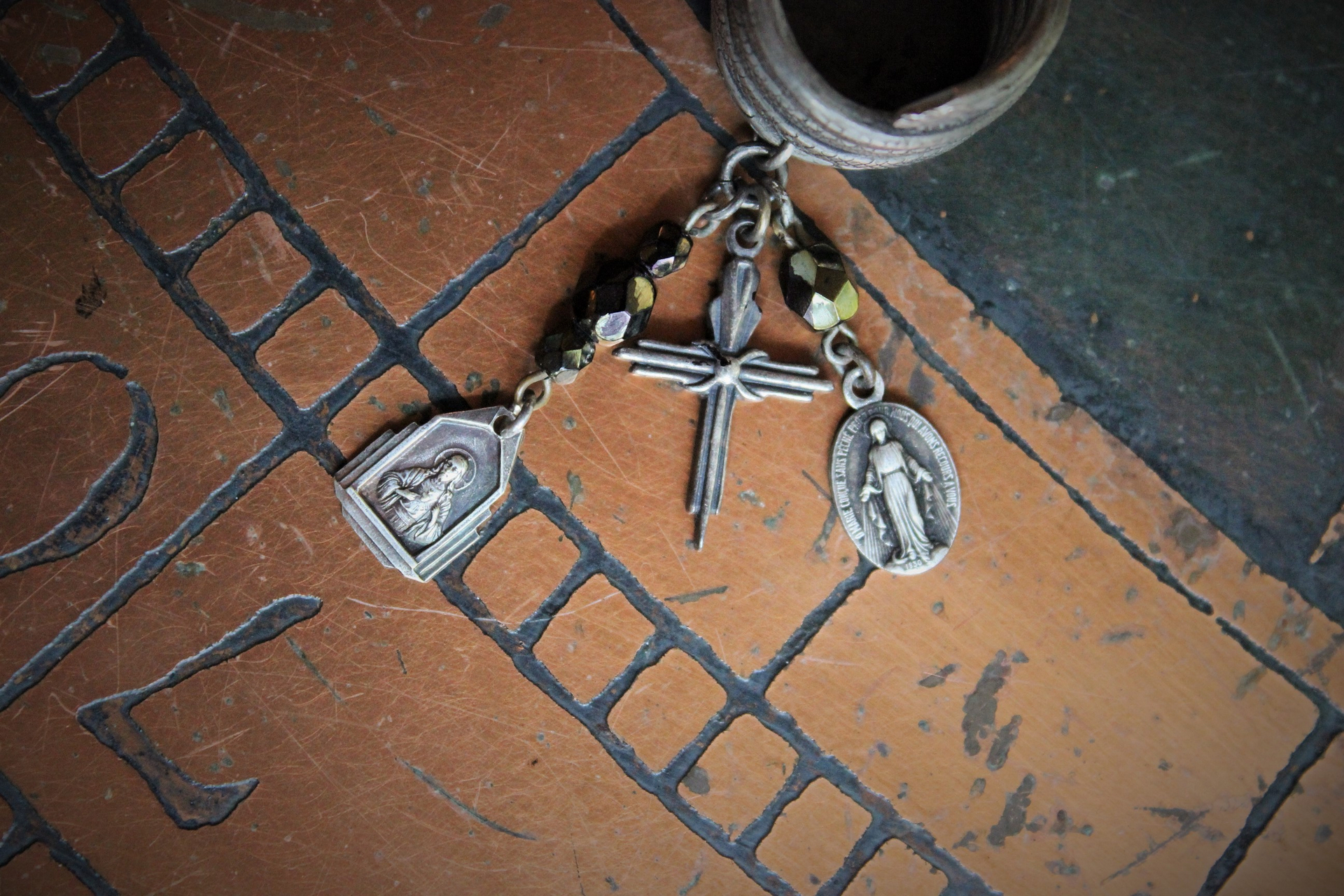 The Triumph Ring w/Antique Sterling Coiled Serpent Band,Antique French Marian & Sacred Heart of Jesus Medals,Antique Sterling Cross,Antique Faceted Glass Bead Connectors