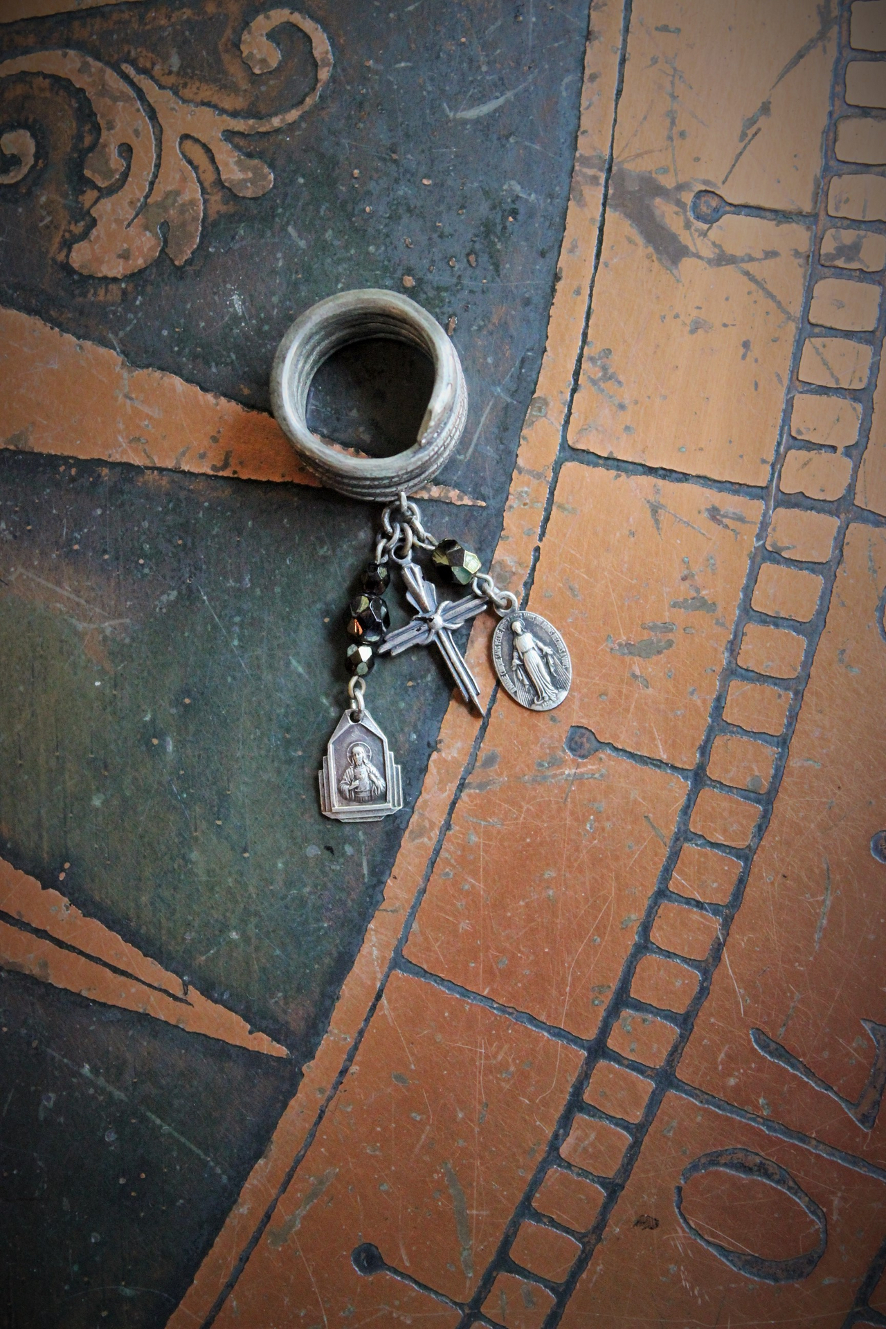 The Triumph Ring w/Antique Sterling Coiled Serpent Band,Antique French Marian & Sacred Heart of Jesus Medals,Antique Sterling Cross,Antique Faceted Glass Bead Connectors