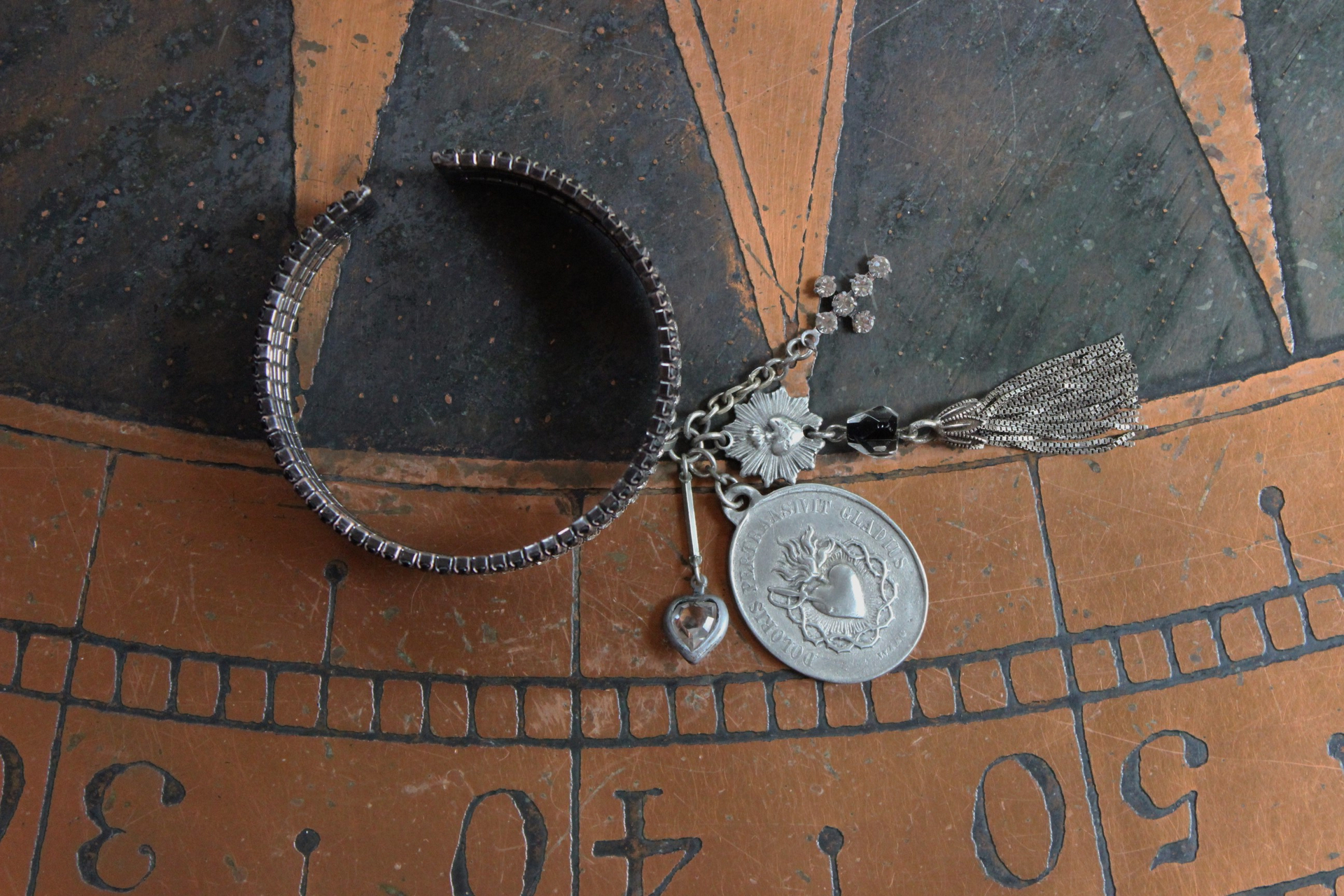 I Loved you in the End Cuff Bracelet with French Medals, Sterling Tassel,Antique Crystal Heart, and Antique Rhinestone Cross