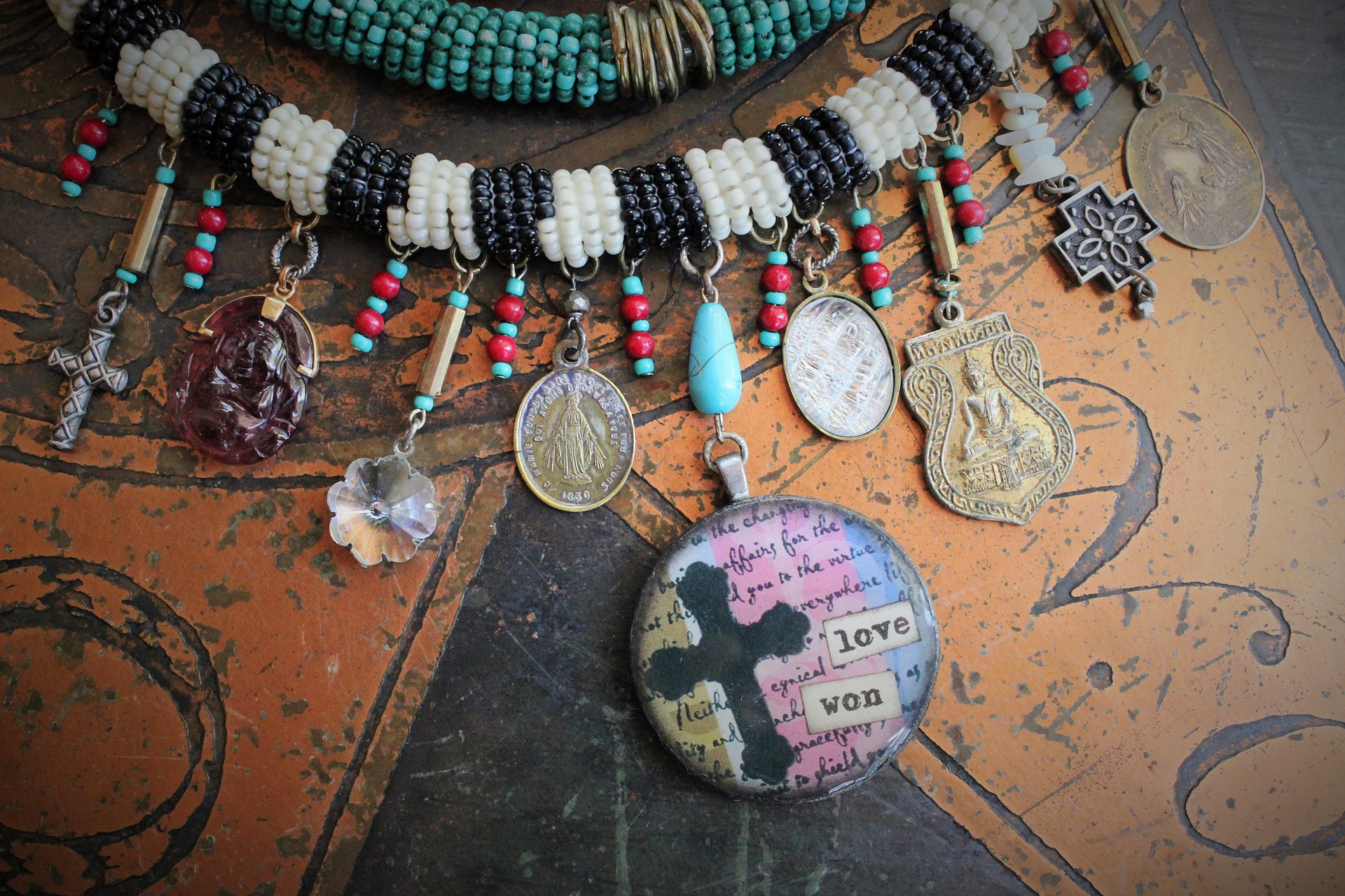 NEW! Peace with your Soul Necklace with Unique 3 Strand Seed Bead Finding,"Love Won" Pendant,Antique French & Tibetan Medals,Carved Tourmaline Buddha & More!