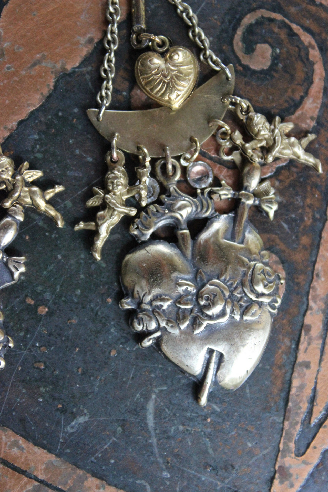 Cast Bronze Flaming Sacred Earrings with tiny Cherubs, Crystals, and Puffy Hearts